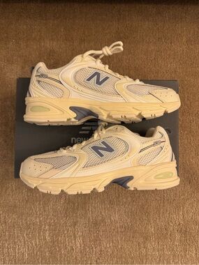 New Balance Cream Sneakers with Light Blue Accents